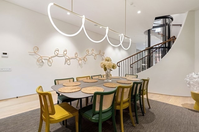 dining area with hardwood / wood-style floors