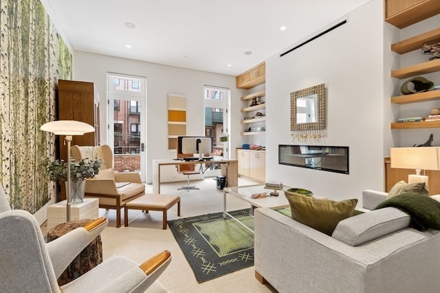 carpeted living room with built in shelves