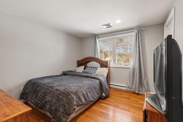 bedroom featuring light wood-type flooring