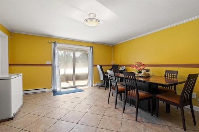 dining space featuring crown molding, a baseboard radiator, and light tile patterned flooring