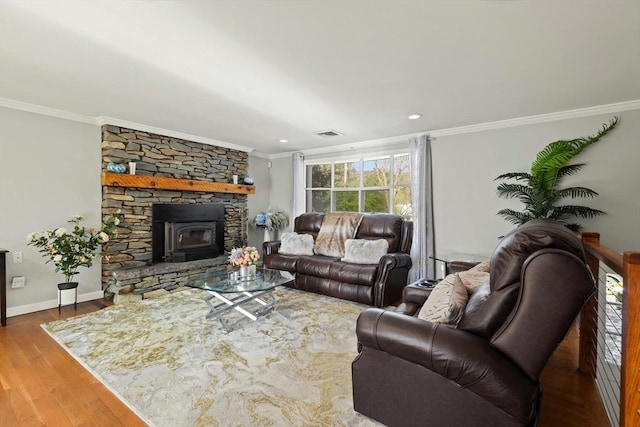 living room featuring hardwood / wood-style floors and crown molding