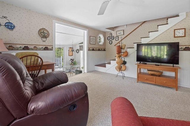 77 Center St, Ashburnham, MA 01430 - living room with wallpapered walls, stairs, a wainscoted wall, carpet floors, and ceiling fan