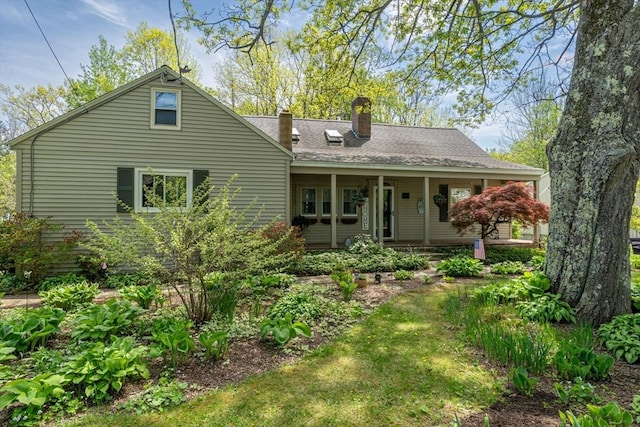 77 Center St, Ashburnham, MA 01430 - rear view of property with a chimney and covered porch