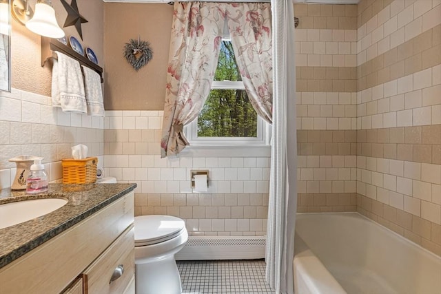 77 Center St, Ashburnham, MA 01430 - bathroom featuring tile walls, toilet, tile patterned floors, vanity, and shower / bath combo with shower curtain