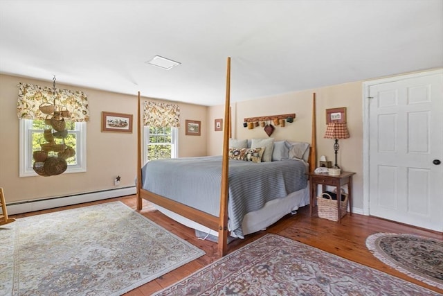 77 Center St, Ashburnham, MA 01430 - bedroom with a baseboard radiator and wood finished floors