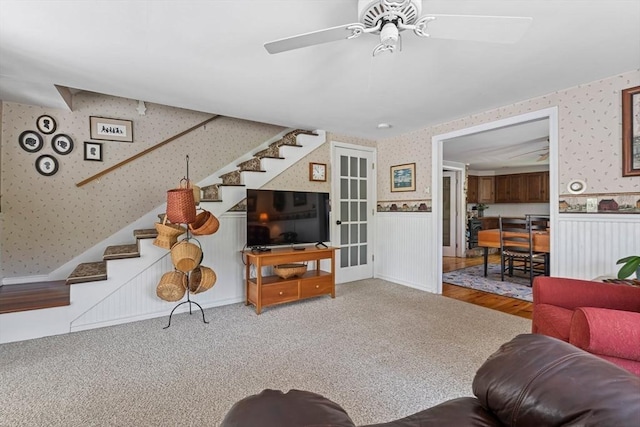 77 Center St, Ashburnham, MA 01430 - carpeted living room with wallpapered walls, stairway, a wainscoted wall, and ceiling fan