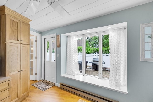 2 Ridge Rd, East Longmeadow, MA 01028 - entrance foyer featuring baseboard heating, light wood finished floors, and baseboards
