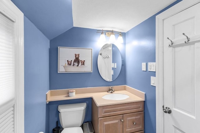 2 Ridge Rd, East Longmeadow, MA 01028 - half bathroom with toilet, vanity, and vaulted ceiling