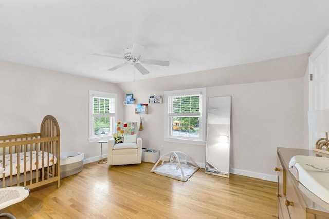 2 Ridge Rd, East Longmeadow, MA 01028 - bedroom featuring multiple windows, light wood finished floors, and baseboards