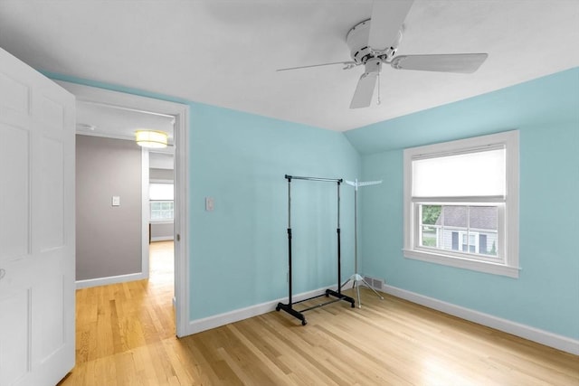 2 Ridge Rd, East Longmeadow, MA 01028 - unfurnished bedroom with light wood-type flooring, baseboards, a ceiling fan, and lofted ceiling