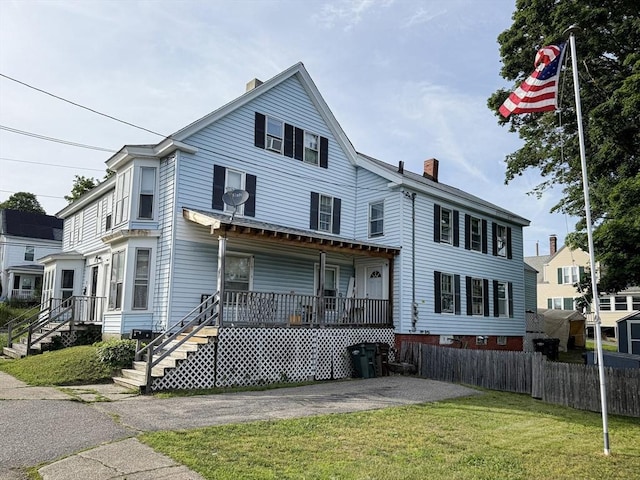 17-19 Whitehall Rd, Amesbury, MA 01913 - view of front of home featuring a chimney and covered porch