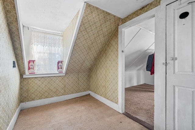 17-19 Whitehall Rd, Amesbury, MA 01913 - bonus room with carpet floors, wallpapered walls, and vaulted ceiling