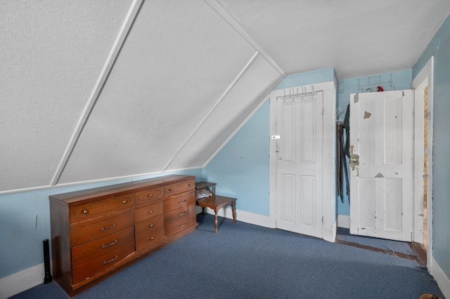 17-19 Whitehall Rd, Amesbury, MA 01913 - additional living space with vaulted ceiling and dark colored carpet