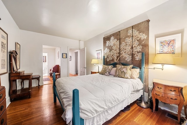 bedroom featuring dark wood-type flooring