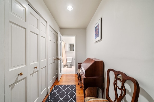 hall with light wood-type flooring