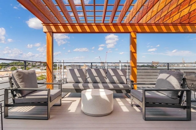 deck with a pergola and an outdoor hangout area