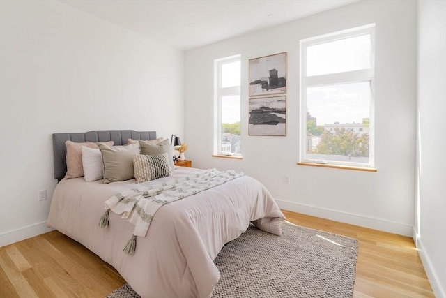 bedroom featuring light wood-type flooring