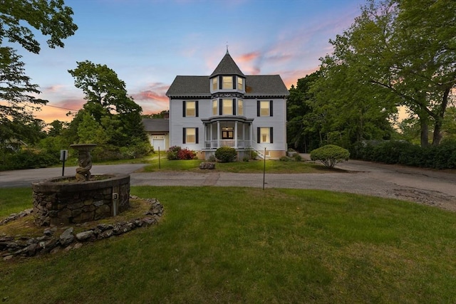 543 Newport Ave, Attleboro, MA 02703 - victorian house with a front yard and curved driveway