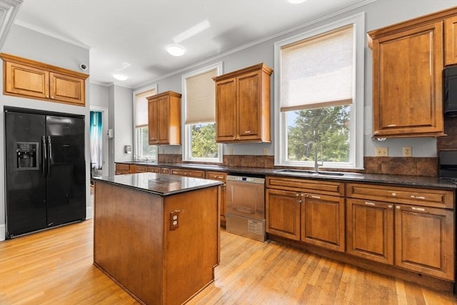 543 Newport Ave, Attleboro, MA 02703 - kitchen with black appliances, a sink, light wood finished floors, brown cabinets, and ornamental molding