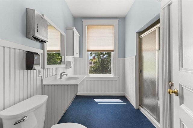 543 Newport Ave, Attleboro, MA 02703 - full bathroom with toilet, a wainscoted wall, a shower stall, and vanity