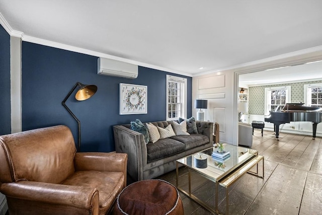 living room featuring crown molding, an accent wall, an AC wall unit, wood finished floors, and baseboards