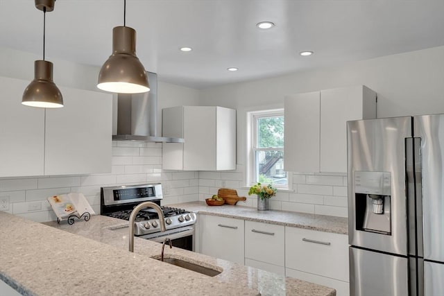 215 Norfolk St Unit 2, Cambridge, MA 02139 - kitchen with stainless steel appliances, wall chimney exhaust hood, modern cabinets, light stone counters, and recessed lighting