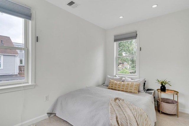 215 Norfolk St Unit 2, Cambridge, MA 02139 - bedroom with recessed lighting and light wood-style floors