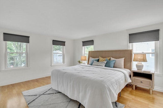 215 Norfolk St Unit 2, Cambridge, MA 02139 - bedroom featuring light wood-type flooring and baseboards