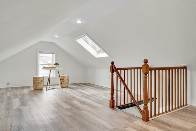 215 Norfolk St Unit 2, Cambridge, MA 02139 - bonus room with a skylight, vaulted ceiling, wood finished floors, and recessed lighting