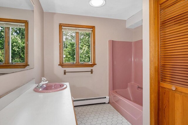 8 Horseshoe Dr, Acton, MA 01720 - full bathroom featuring baseboard heating, healthy amount of natural light, tile patterned flooring, and tub / shower combination