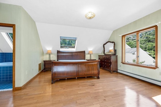8 Horseshoe Dr, Acton, MA 01720 - bedroom featuring light wood-style flooring, vaulted ceiling, and baseboard heating