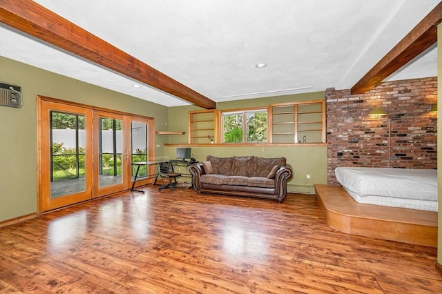 8 Horseshoe Dr, Acton, MA 01720 - living area featuring beam ceiling, healthy amount of natural light, wood finished floors, french doors, and recessed lighting