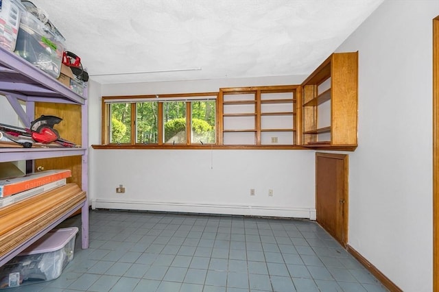 8 Horseshoe Dr, Acton, MA 01720 - storage room with a baseboard radiator