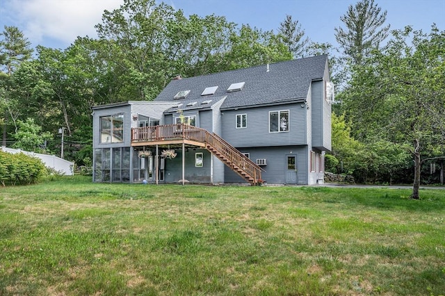8 Horseshoe Dr, Acton, MA 01720 - back of property featuring stairs, a deck, roof with shingles, a sunroom, and a lawn