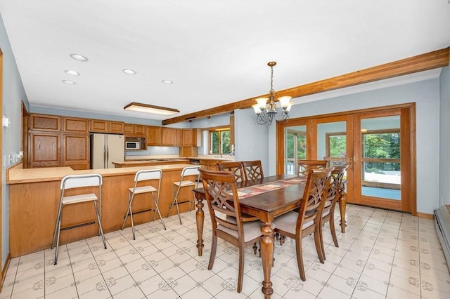 8 Horseshoe Dr, Acton, MA 01720 - dining area featuring light floors, a chandelier, french doors, recessed lighting, and a baseboard radiator