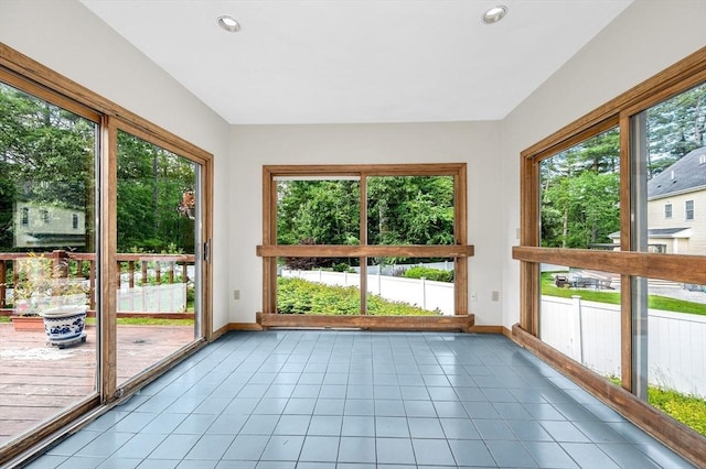 8 Horseshoe Dr, Acton, MA 01720 - unfurnished sunroom with plenty of natural light, tile patterned flooring, and recessed lighting
