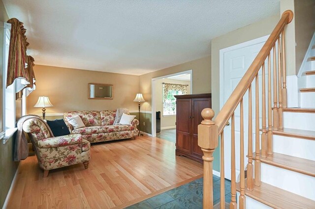 20 Bowdoin Dr, Haverhill, MA 01830 - living room featuring wood finished floors and stairs
