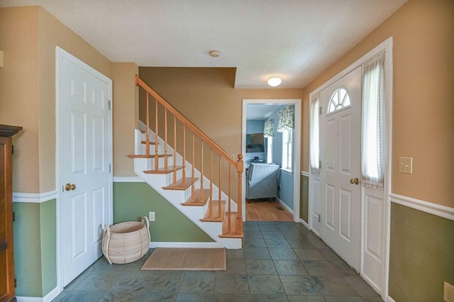 20 Bowdoin Dr, Haverhill, MA 01830 - foyer entrance featuring stairway and baseboards