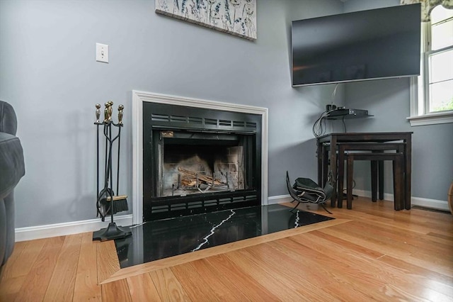 20 Bowdoin Dr, Haverhill, MA 01830 - detailed view of wood finished floors and a fireplace
