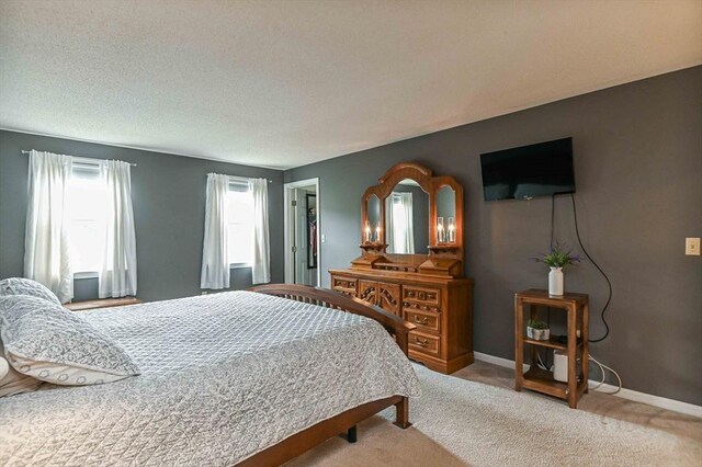 20 Bowdoin Dr, Haverhill, MA 01830 - carpeted bedroom with a textured ceiling