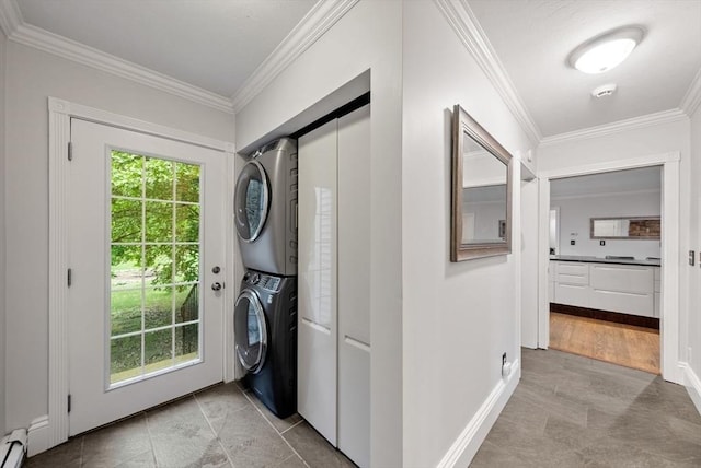 176 Spring St, Hopkinton, MA 01748 - laundry room featuring estacked washer and dryer, a baseboard radiator, crown molding, baseboards, and light tile patterned floors