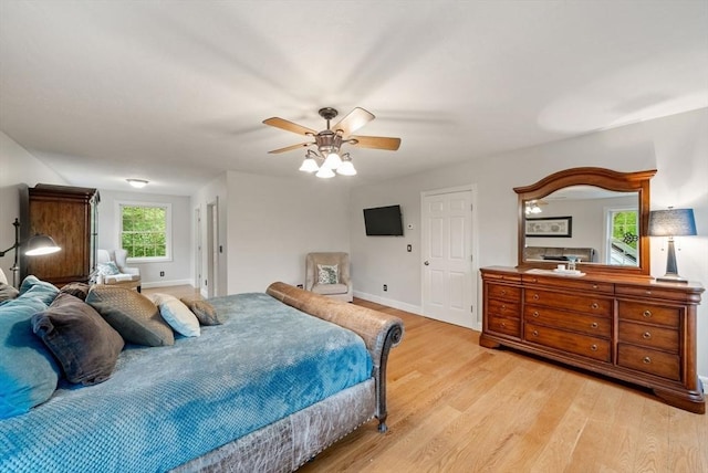176 Spring St, Hopkinton, MA 01748 - bedroom featuring light wood-type flooring, baseboards, and a ceiling fan