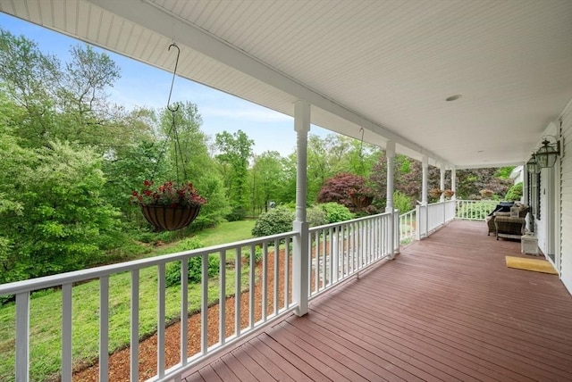 176 Spring St, Hopkinton, MA 01748 - deck with a lawn and view of scattered trees