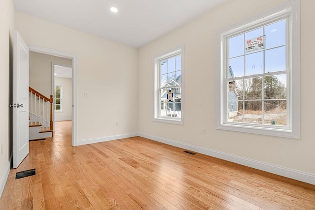 66-3 Parish Rd, Georgetown, MA 01833 - spare room with baseboards, light wood-type flooring, healthy amount of natural light, and recessed lighting