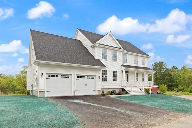 66-3 Parish Rd, Georgetown, MA 01833 - view of front of property with a porch, an attached garage, driveway, a front lawn, and a shingled roof