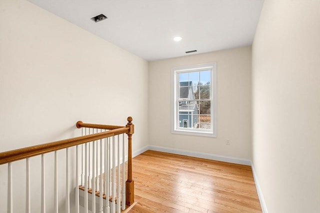 66-3 Parish Rd, Georgetown, MA 01833 - unfurnished room with wood-type flooring, baseboards, and recessed lighting