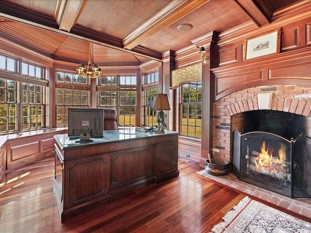 office space featuring wood ceiling, coffered ceiling, and crown molding