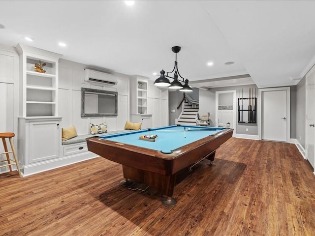 game room with recessed lighting, an AC wall unit, pool table, and wood finished floors