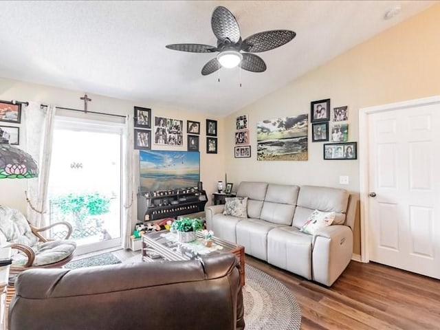 1244 Corktree E, Port Charlotte, FL 33952 - living room featuring vaulted ceiling, wood finished floors, and ceiling fan
