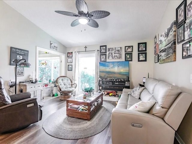 1244 Corktree E, Port Charlotte, FL 33952 - living area featuring wood finished floors, a ceiling fan, and a textured ceiling